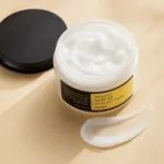 COSRX Advanced Snail 92 All In One Cream 100ml real product skincare setup with authentic jar and cream texture